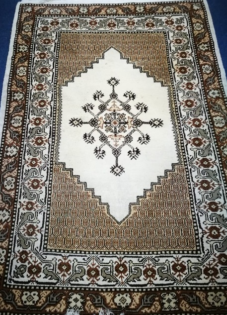 A modern Eastern rug, woven with two rows of botehs 215 x 146cm